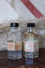 Load image into Gallery viewer, Pair of Antique French Chemist Bottles
