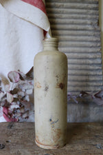 Load image into Gallery viewer, Tall Antique Stoneware Bottle
