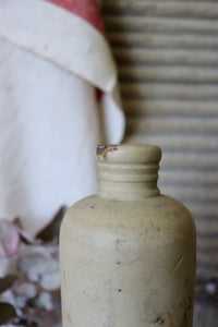 Tall Antique Stoneware Bottle