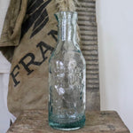 Load image into Gallery viewer, Vintage Embossed Glass Dairy Bottle
