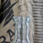 Load image into Gallery viewer, Vintage Embossed Glass Dairy Bottle

